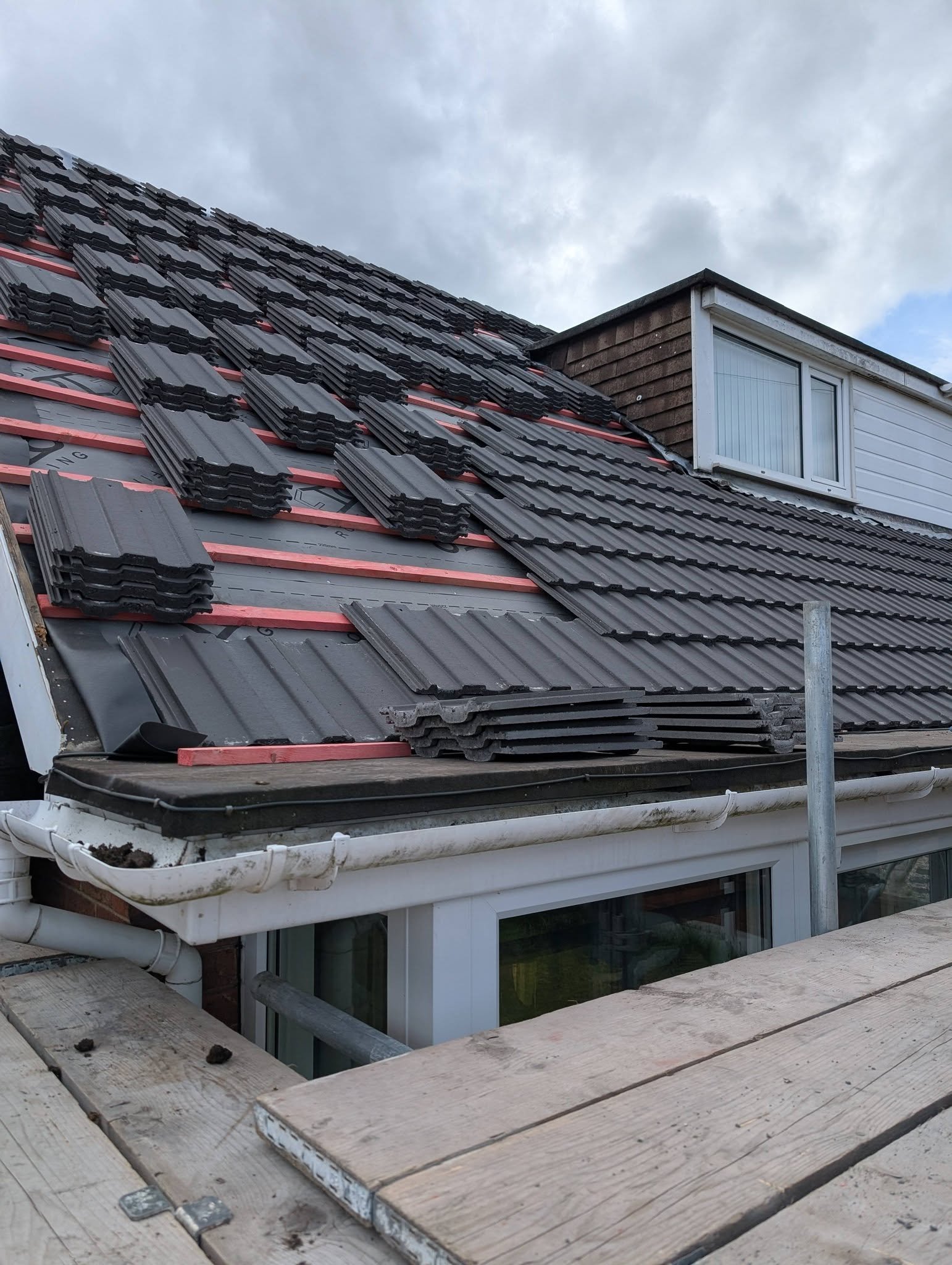 New roof tiles being installed, Borras, Wrexham